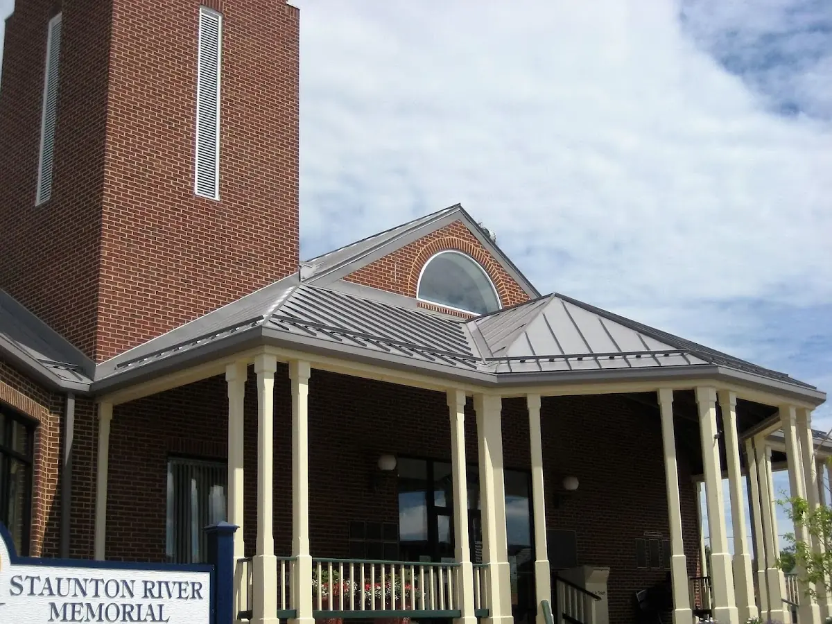 Skilled roofing craftsmen working on a residential roof in Indian River Bluff